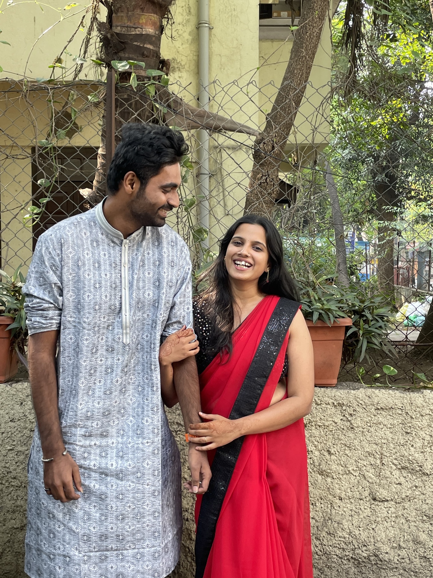 Nikita and Pranav laughing together